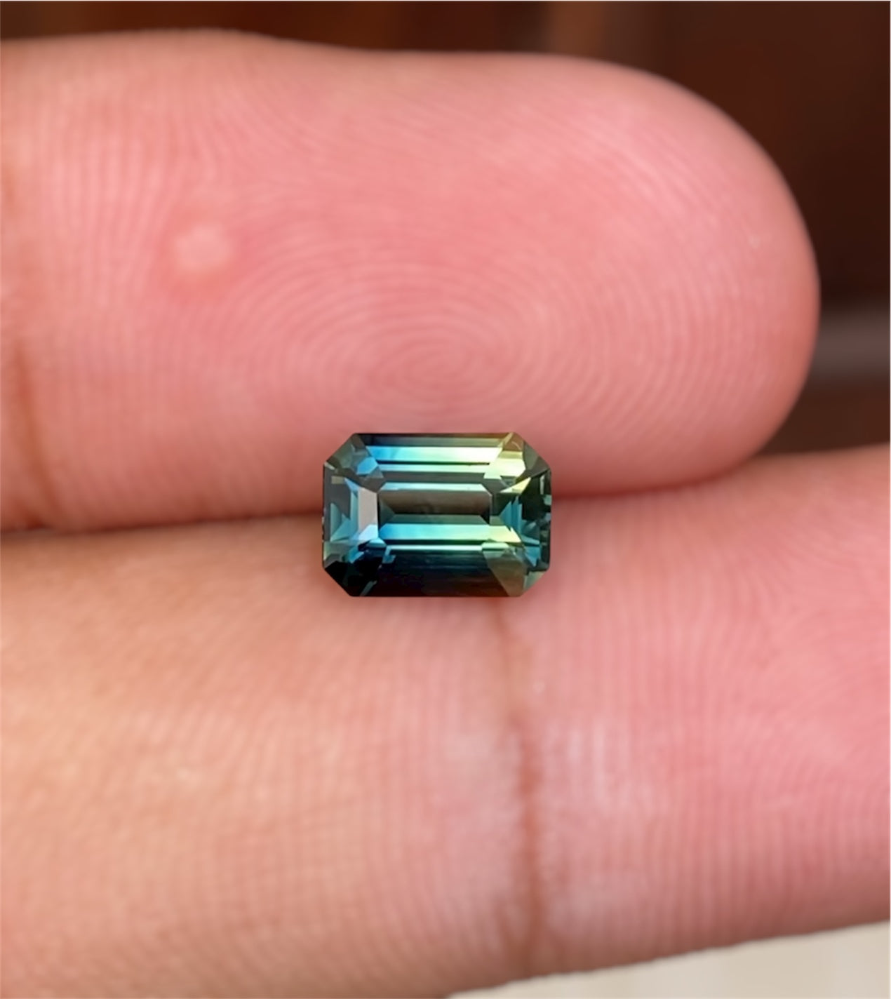 Australian Bi-Colour/Teal Sapphire - 1.65 Carat - Emerald Cut - Unheated