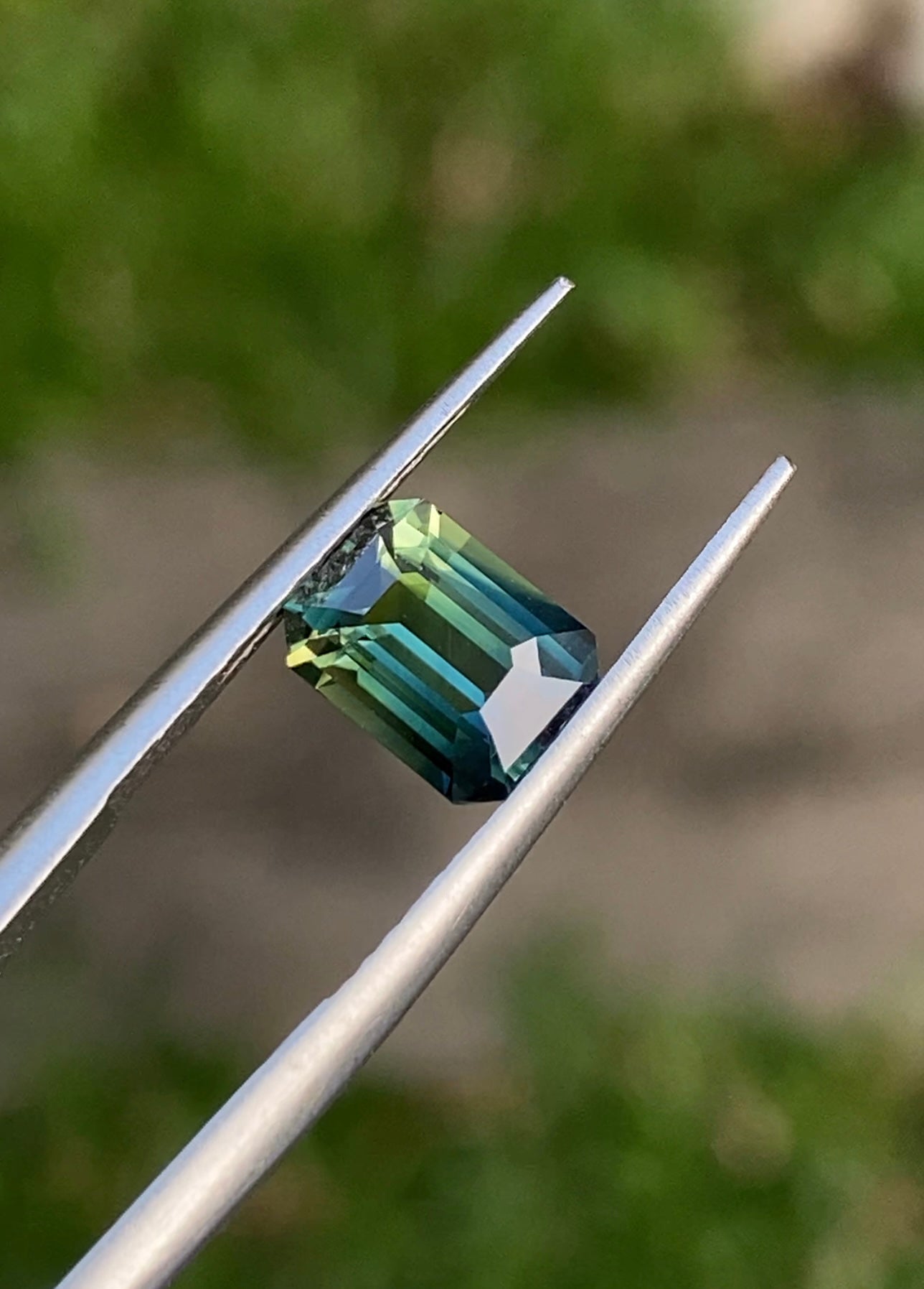 Australian Bi-Colour/Teal Sapphire - 1.65 Carat - Emerald Cut - Unheated