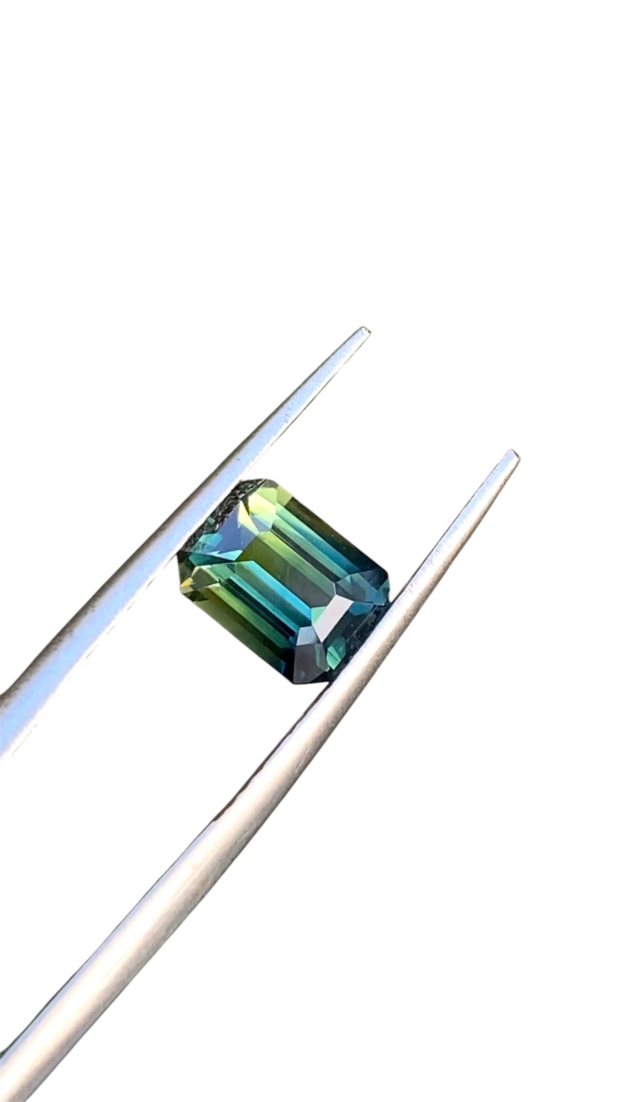 Australian Bi-Colour/Teal Sapphire - 1.65 Carat - Emerald Cut - Unheated